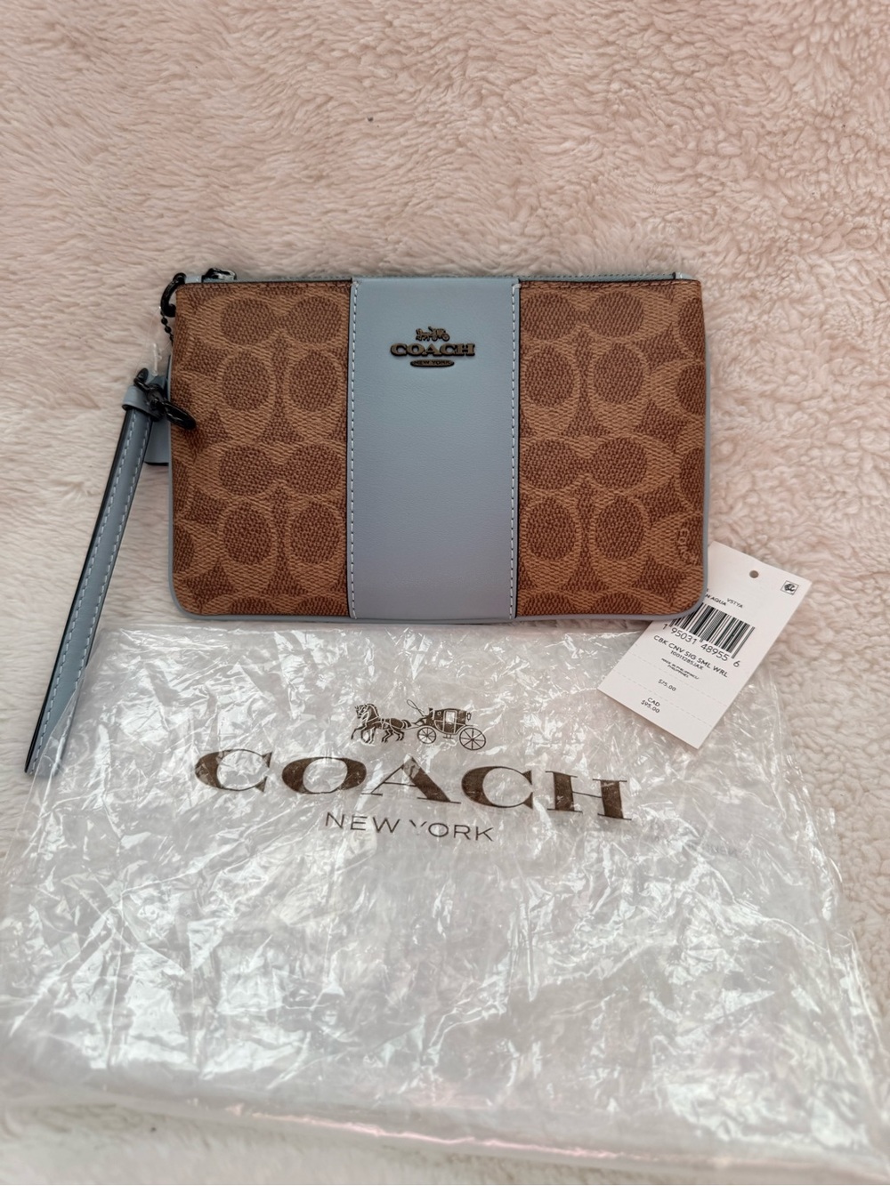 Coach Brown Signature Canvas Wristlet with blue leather Trim
